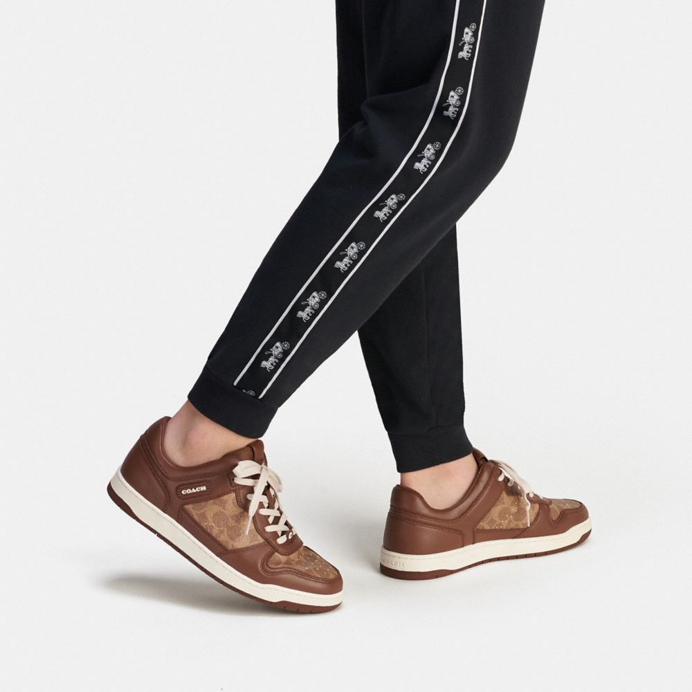 Coach C201 Sneaker In Signature Canvas Saddle | 478-HLPZUI